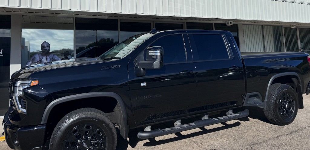 Black Silverado with window tinting at Local Guys