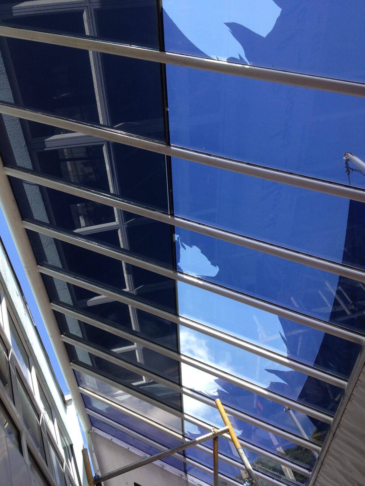 After. Retail canopy solar film by Local Guys